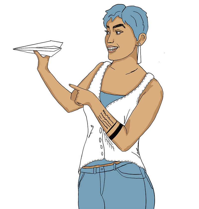 A woman holding a paper airplane in her hand.