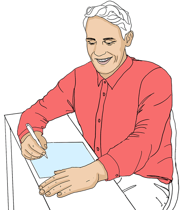 Un homme assis à une table qui écrit quelque chose sur une feuille de papier.